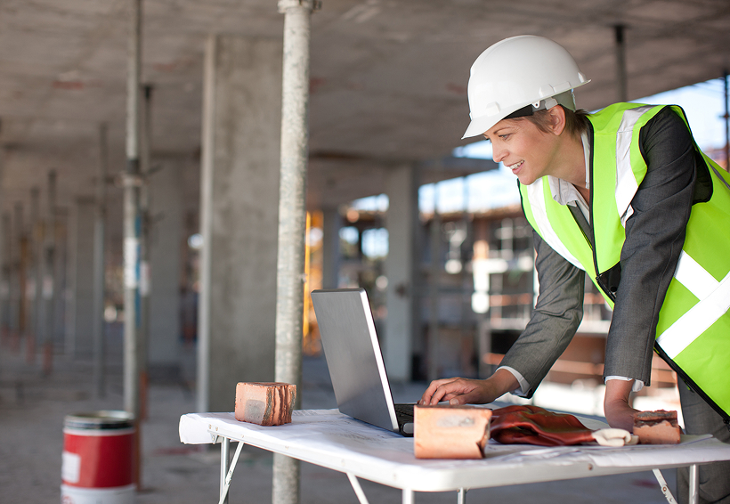 Engineer in safety gear at construction site